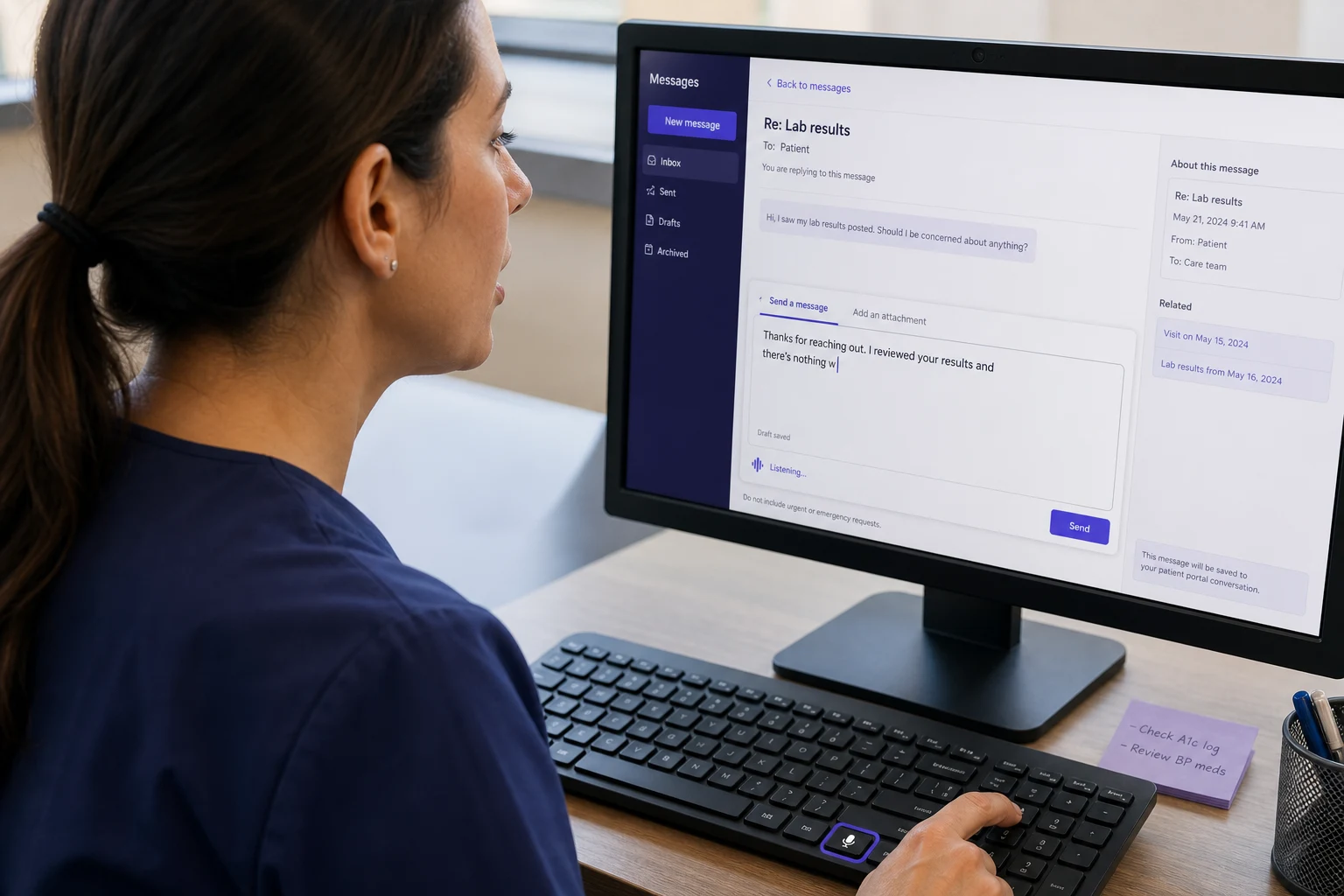 A clinician dictating a reply directly into a patient portal message